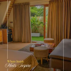 The inside meets the outside seamlessly in our cottages. Large glass doors open up to your private garden, filling the room with natural light and views of the surrounding greenery.