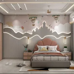 The headboard wall in this kids' room is a dream come true, with a cloud-shaped, backlit panel and a beautiful mural. The shell-shaped headboard adds a touch of fantasy.