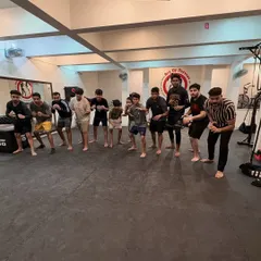 Different backgrounds, one mat, one mindset. Our community is built on mutual respect and the shared grind of martial arts training.