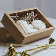 Gifting is my specialty, and I love putting together beautiful custom hampers. This gift box features a set of my molded candles, including a ribbed pillar and a flower design, nestled in a rustic box. It’s a perfect present for birthdays, weddings, or just because.