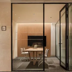 A view of the meeting room at the Elevate Clubhouse in Gurugram. This space provides residents with a professional setting for work or meetings, seamlessly integrated into the luxurious clubhouse environment.
