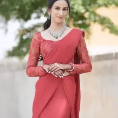 For this modern reception look, I created soft, glowing skin and paired it with a sophisticated hairstyle. The elegant red saree and diamond jewelry complete this stunning party-ready appearance.