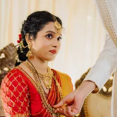A significant moment during the ceremony. Her makeup is flawless and long-lasting, ensuring she looks perfect during all the important rituals.