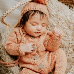 Those first few weeks are a blur of tiny yawns and peaceful dreams. I create a safe, warm space in my studio to capture your newborn's delicate features while they sleep, preserving the magic of their earliest days.