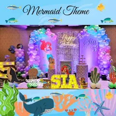 Sia's 5th birthday was a mermaid dream come true. We used a sparkling sequin backdrop, a neon "Happy Birthday" sign, and character cutouts from The Little Mermaid to create a vibrant and magical underwater celebration.