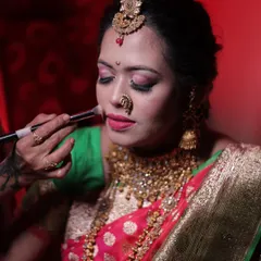 The process of creating a flawless bridal base. I guide my students through every step, from skin prep to the final touch.