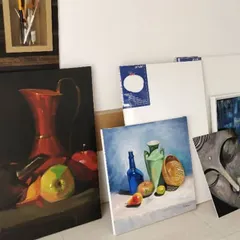 This is a corner of my studio, filled with a few of my completed paintings and blank canvases ready for new ideas. I'm obsessed with this wall!