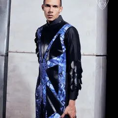 A closer look at the Electric Noir kurta. The sculpted geometry, cobalt panels, and metallic details create a fearless statement built for the modern warrior.