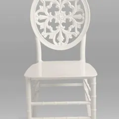 For a more elegant and decorative look, we offer banquet chairs like this white one with an ornate backrest. It's a popular choice for weddings and upscale events.