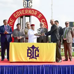 We are honored to host esteemed dignitaries at our events. Here, the Hon'ble Governor of Karnataka, Shri. Thaawar Chand Gehlot, presents The Governor's Cup, highlighting the high-profile networking opportunities and prestige associated with sponsoring a race at our club.