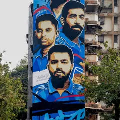 Go big or go home. I had the incredible opportunity to paint this massive 80-foot mural for the Mumbai Indians, featuring cricket legends like Rohit Sharma. This project, visible from the Sion highway, shows how we can turn entire buildings into landmarks.