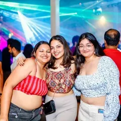 Friends enjoying the music and the vibrant atmosphere. My goal is to create a space where people can connect and have fun.