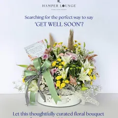 Searching for the perfect way to say 'Get Well Soon'? This thoughtfully curated floral bouquet, with its mix of cheerful yellow and soft purple chrysanthemums, is an exquisite message of care.