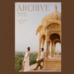 Modern love in a vintage city. This shot of Prince and Khushi in Jaisalmer plays with composition, placing them against the stunning architecture of Bada Bagh to create a stylish, editorial-style portrait.