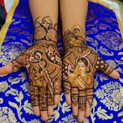 This design showcases a single, detailed portrait of a woman, possibly the bride or a figure of importance to her. The other hand is filled with intricate Arabic and traditional fusion patterns.