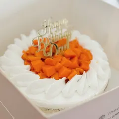 Summer's sweetness in a Classic Mango Cream cake. This one, for a special dad's birthday, is made with a wholewheat base and topped with fresh Alphonso mangoes.