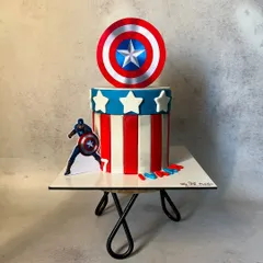 The full view of the Captain America fondant cake, showing its clean lines and bold colors. It's a perfect centerpiece for a superhero-themed birthday bash.
