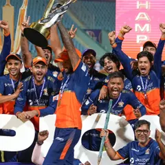 The moment of pure victory. Capturing the Kashi Rudras team lifting the UPT20 League trophy is about documenting the raw emotion and celebration that follows a hard-fought win. This is the ultimate payoff.