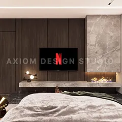 The TV wall in this bedroom features a floating marble console with an integrated fireplace. The dark wood paneling conceals storage, keeping the look clean and sophisticated.