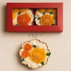 Our Genda Deep Set is a blockbuster. For just ₹999, you get this beautiful set of two floral candles in a red window box, a perfect gift set under 1k.