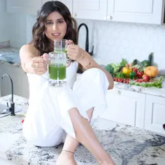 A fun and engaging shot for Dietitian Nicole's portfolio, set in a modern kitchen to create an authentic lifestyle feel.