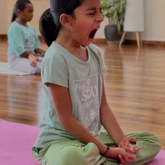 A yawn during meditation practice is not a failure. It is the body releasing tension and fatigue. For children, learning to sit with these sensations without reacting is a powerful lesson in mindfulness and self-awareness.