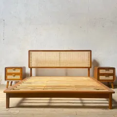 This is one of my most popular designs, a mid-century modern bed frame with a full-length cane headboard, shown here with matching two-drawer nightstands. The entire set is made from solid, seasoned teak wood.