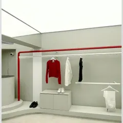 For the ARKS flagship store, we translated the brand's ethos of simplicity and authenticity into a physical space. The design uses a neutral palette with strategic pops of red, creating a clean, uncluttered environment where the apparel and products are the main focus.