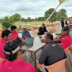 It takes a team to build a champion. Every month, our coaches, trainers, and support staff come together to analyze each athlete's progress, ensuring we are aligned on every goal. Teamwork is our foundation.