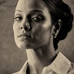 The same portrait with a softer, grainier filter, giving it a vintage, film-like quality. The underlying structure of the makeup and hair remains strong.
