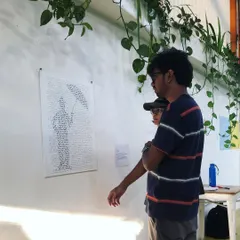 This portrait of Charlie Chaplin is made entirely of Morse code, spelling out his quote: "I always like walking in the rain, so no one can see me crying." It sheds light on the coded ways people often ask for help, inviting viewers to decode the message and reflect on the importance of listening closely.