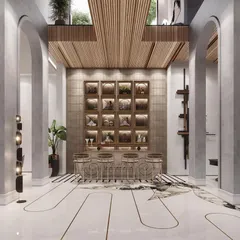 We designed this bar area with classical arches and intricate floor inlays to create a sophisticated entertainment zone. The custom-built bar with integrated shelving provides a stylish focal point for social gatherings.