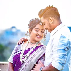 An intimate and gentle portrait of the newly married couple. The soft light and their close embrace create a feeling of warmth and love on their special day.