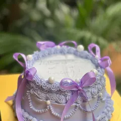 Another take on the vintage burn away cake, this one in a lovely shade of purple with matching ribbons. It’s all about the little details.