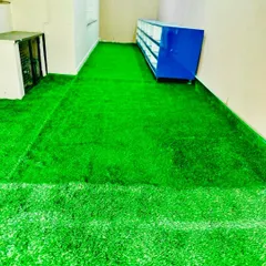 A closer look at the texture of our turf used in an indoor setting. It provides a soft and visually interesting flooring alternative for commercial or residential rooms.