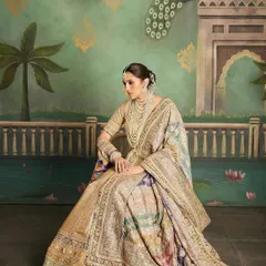 This custom Abu Jani Sandeep Khosla lehenga is fit for royalty. The rich gold detailing, vibrant colors, and traditional motifs create a heritage look that is both radiant and regal, ideal for a grand wedding ceremony.