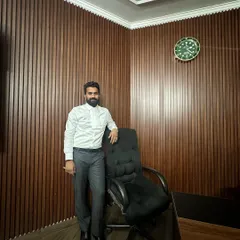 A moment in my office. I believe that success in the legal field is not found by waiting, but by being deeply engaged in the work of representing and defending my clients.
