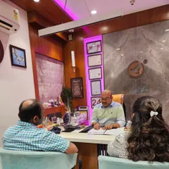 A couple seeking guidance in my office. I offer joint counseling sessions to help partners understand each other better through the lens of numerology and counseling.