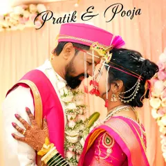 A classic Maharashtrian wedding portrait, capturing the couple's traditional attire with the bride's Mundavalya and the groom's Pheta. The focus is on their connection, a quiet moment of togetherness amidst the celebration.