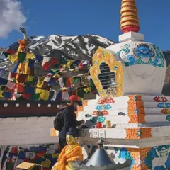 Here you can see the Stupa with the Himalayan peaks and prayer flags in the background. It was an honor to contribute to the restoration of this sacred structure and learn from a local craftsman.