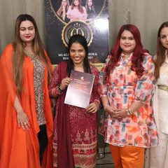 A proud moment during our certification ceremony. Each student receives their certificate, marking the successful completion of their training and the beginning of their new career as a beauty professional.