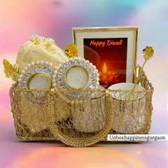 Another angle of the 'Golden Glow' basket, showing how the pearl diyas can be placed outside the basket for a beautiful display.