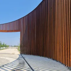 This detail shot shows the weathering process of a Corten steel gate we designed in Raipur. We choose materials that evolve over time, developing a natural patina that grounds the structure in its environment and tells a story of its own.