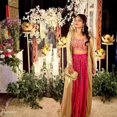 Ready for the celebration. For weddings and festive occasions, I help you curate looks that are elegant, memorable, and uniquely you. This indo-western outfit in pink and gold is perfect for making a statement with grace.
