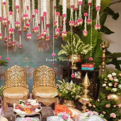 I believe magic lies in the details, especially during intimate pre-wedding rituals. This setup features traditional brass decor, fragrant flower garlands, and beautifully wrapped gifts, creating a serene and sacred space for the bride's family ceremonies.