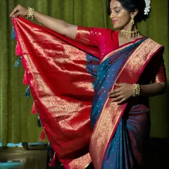 The beauty of a silk saree is in its details, especially the pallu. Here, I have styled a traditional Kanjivaram saree to showcase the rich zari work on the pallu. This draping style is perfect for weddings and festive events where you want the saree's craftsmanship to be the highlight.