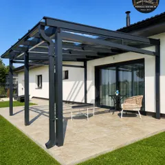 This design showcases our attention to practical details. The modern glass pergola includes an integrated gutter and downspout system, ensuring efficient rainwater management while maintaining a clean, uncluttered aesthetic.