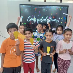 Here are the winners of our Grade 1 team competition, proudly holding their golden bookmark trophies! These activities encourage cooperation, leadership, and respect among our youngest learners.