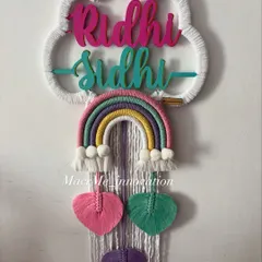 This double-name dream catcher for Riddhi and Sidhi was such a joy to create. The hanging hearts and pastel rainbow make it a perfect piece of decor for siblings sharing a room.