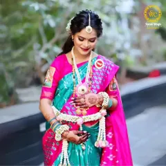 The complete look for a traditional Marathi 'dohale jevan'. The floral jewellery set, complete with hathphool and a waist belt, makes the celebration even more special.